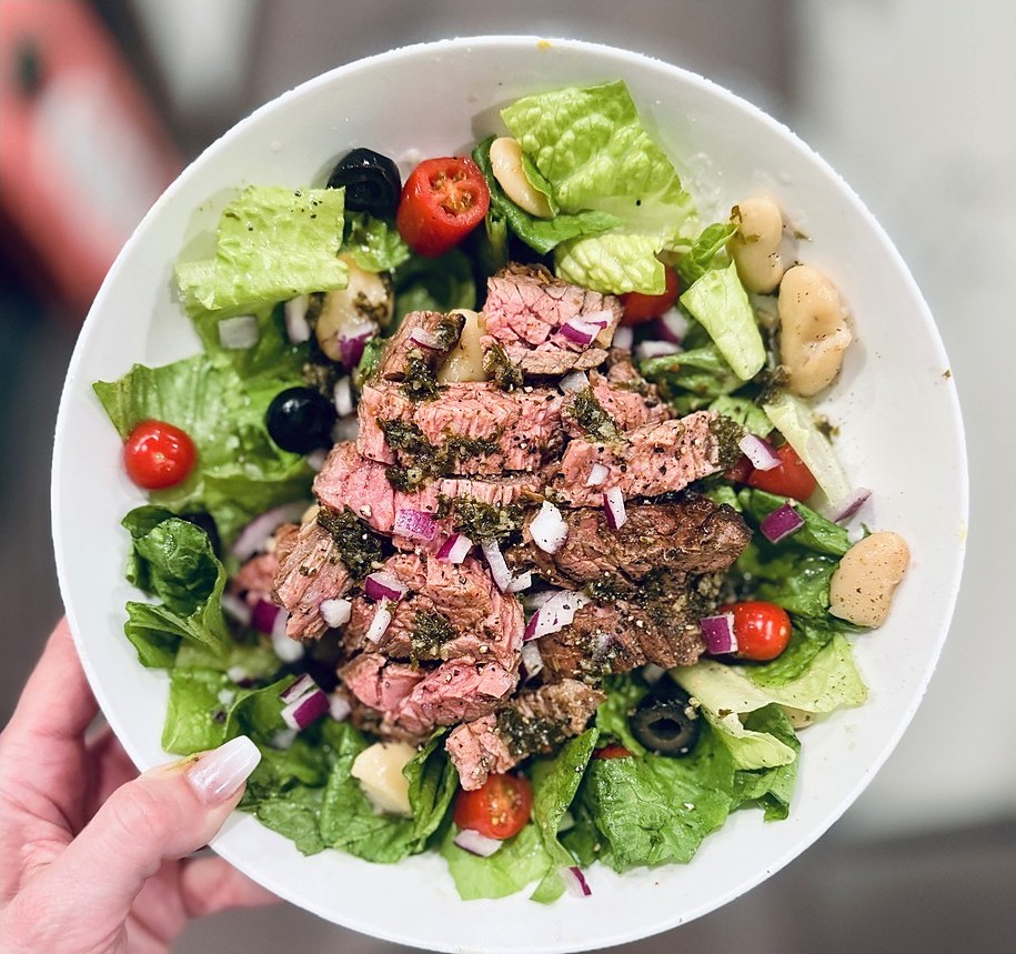 Chimichurri steak salad with butter beans and olives