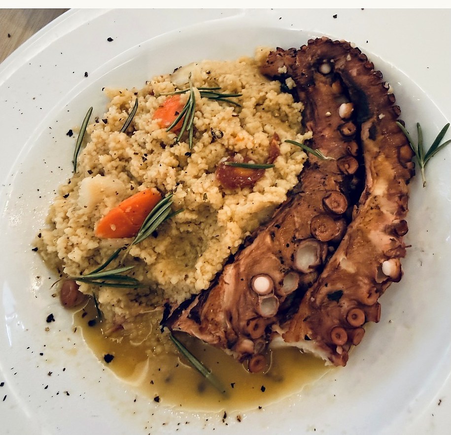 Coastal octopus with couscous, rosemary, and citrus jus